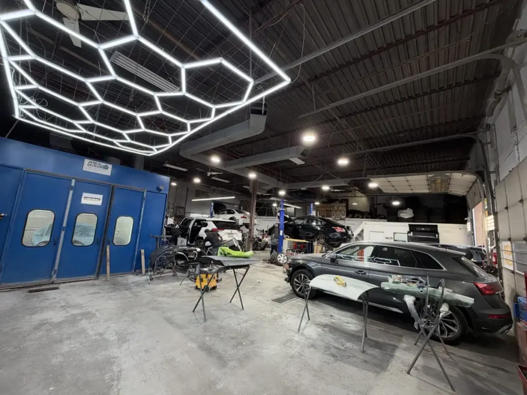 Inside ZhoopZhoop Collision & Mechanical in Thornhill: paint booth and collision repair bays